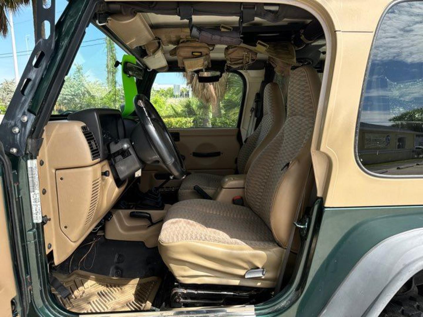 1999 Forest Green Pearlcoat /Agate Vinyl Jeep Wrangler Sport (1J4FY19S5XP) with an 4.0L L6 OHV 12V engine, located at 11100 Summerlin Square Dr., Fort Myers Beach, FL, 33931, (239) 999-7777, 26.493452, -81.938683 - Photo#13