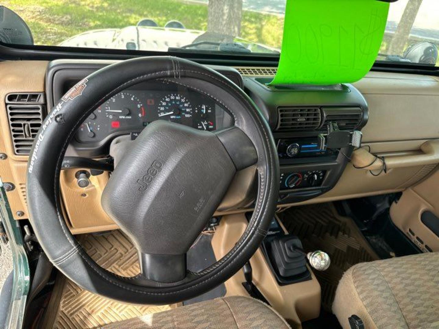 1999 Forest Green Pearlcoat /Agate Vinyl Jeep Wrangler Sport (1J4FY19S5XP) with an 4.0L L6 OHV 12V engine, located at 11100 Summerlin Square Dr., Fort Myers Beach, FL, 33931, (239) 999-7777, 26.493452, -81.938683 - Photo#23