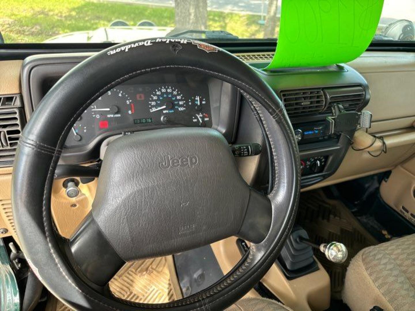 1999 Forest Green Pearlcoat /Agate Vinyl Jeep Wrangler Sport (1J4FY19S5XP) with an 4.0L L6 OHV 12V engine, located at 11100 Summerlin Square Dr., Fort Myers Beach, FL, 33931, (239) 999-7777, 26.493452, -81.938683 - Photo#26