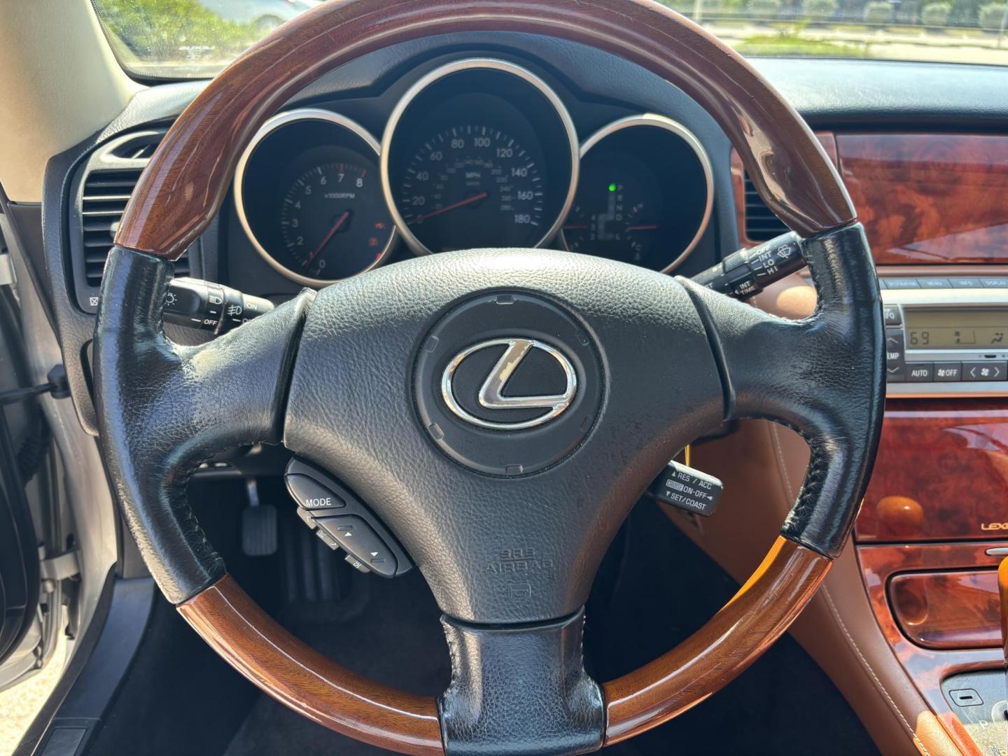 2002 SILVER /BROWN Lexus SC 430 Convertible (JTHFN48Y820) with an 4.3L V8 DOHC 32V engine, 5-Speed Automatic Overdrive transmission, located at 11170 Summerlin Square Dr., Fort Myers Beach, FL, 33931, (239) 999-7777, 26.493546, -81.941628 - Photo#20