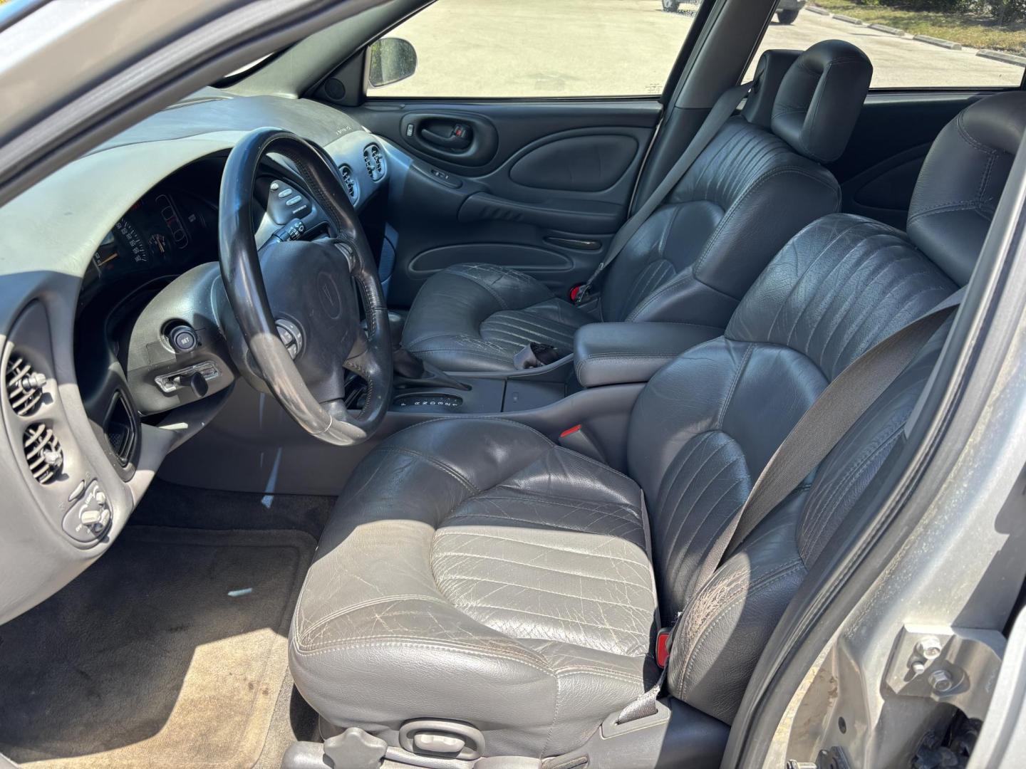 2000 SILVER Pontiac Bonneville SE (1G2HX54KXY4) with an 3.8L V6 OHV 12V engine, 4-Speed Automatic Overdrive transmission, located at 11170 Summerlin Square Dr., Fort Myers Beach, FL, 33931, (239) 999-7777, 26.493546, -81.941628 - Photo#8